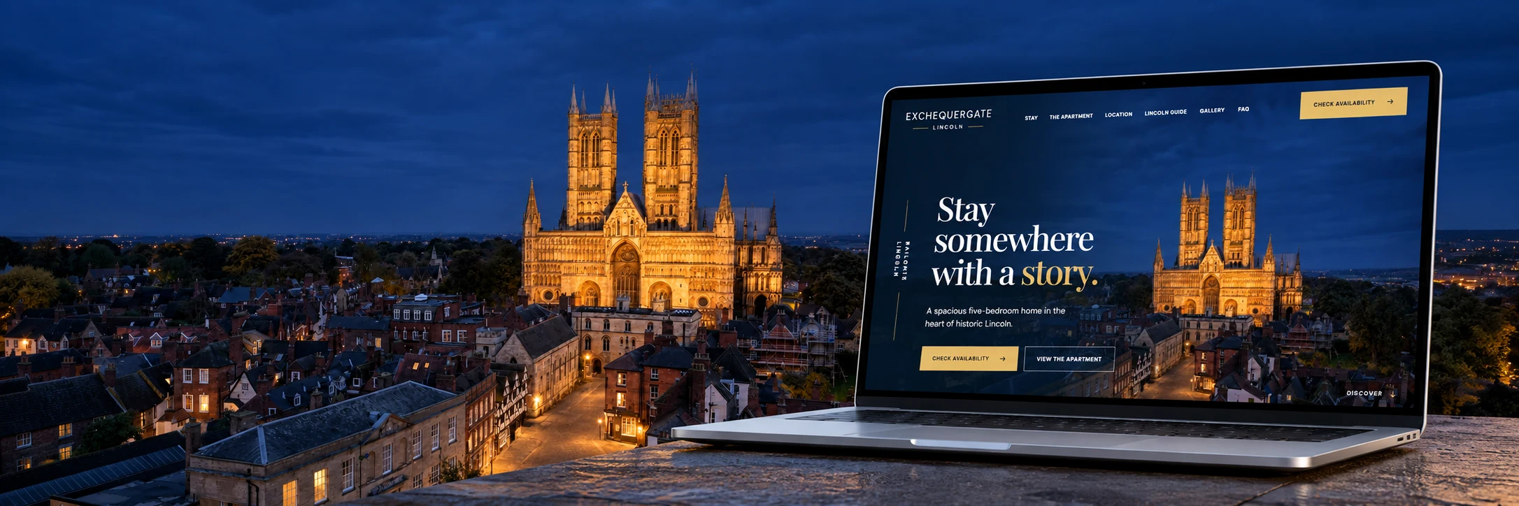 Exchequergate's website displayed on a laptop overlooking Lincoln Cathedral at dusk